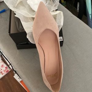 New, in the box, suede pumps. Size 8.5., color is “subtle pink”.